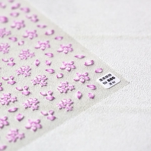 Detail of pink cherry blossom nail stickers featuring thin film floral pattern TO-886