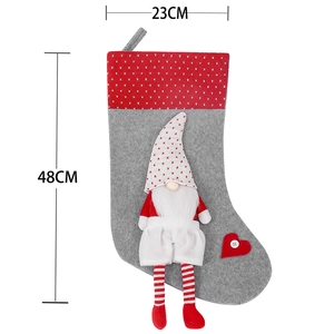 Grey felt Christmas stocking with gnome design, red polka dot hat and 48cm height