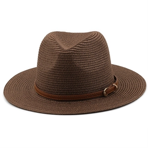 Detail of woven straw fedora featuring a slim brown leather band and gold buckle