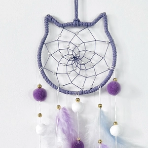 Purple owl-shaped dreamcatcher with feathers and beads for kid's bedroom wall decor