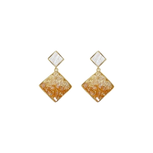 Elegant geometric rhombus earrings with white shell studs and amber resin drops