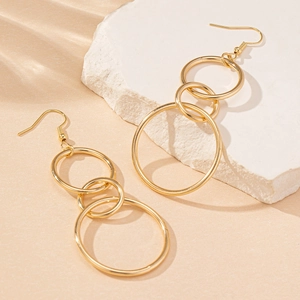 Fashionable golden triple interlocking hollow circle drop earrings with fishhook backing
