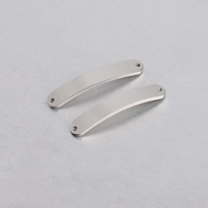 Detail of 6x35mm curved stainless steel pendant connectors with smooth mirror finish