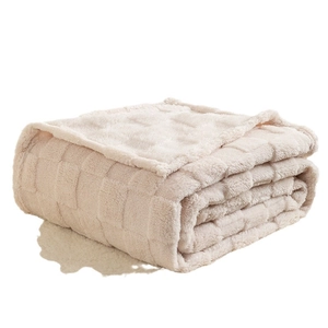 Thick checkered waffle pattern plush blanket in creamy white soft fleece fabric
