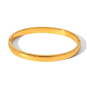 Detail shot of the 18K gold plated stainless steel clasp on a glossy flat bangle