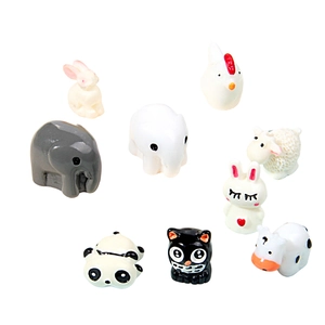 Nine mini resin animal figurines including cow and panda for micro landscape gardening