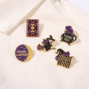 5-piece vintage witch enamel pins set with crescent moon and magic potion on white fabric