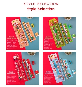 Detailed view of 5-piece Christmas stationery set featuring ruler, pencils, and sharpener