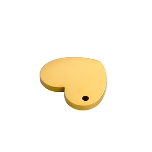 Close-up of golden stainless steel heart pendant with polished finish and hanging hole