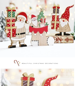Detailed view of festive wooden Santa Claus and gnome ornaments for holiday decor