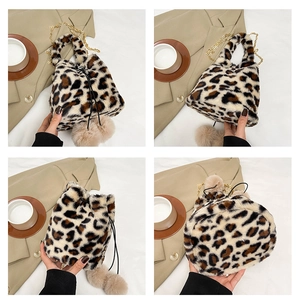 Detail of leopard print plush bucket bag with golden chain strap and drawstring closure