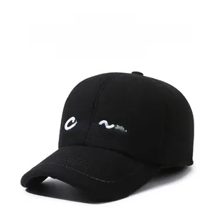 Detailed macro view of woolen baseball cap fabric with white embroidered china lettering