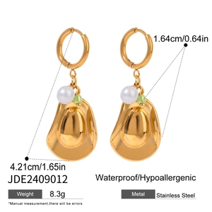 Waterproof stainless steel drop earrings with white pearls and green charms on white base