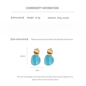 Dimensions détaillées du produit indiquant 6,5 cm de long pour les boucles d'oreilles