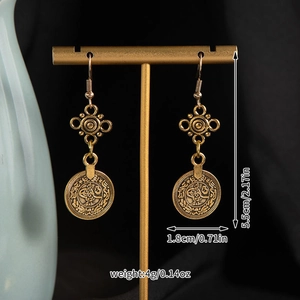 Detail of vintage gold alloy coin tassel earrings with precise size measurements