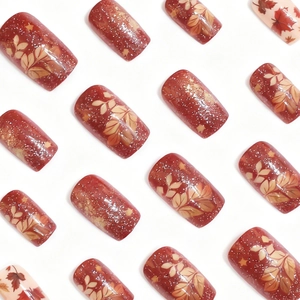 24pcs Fall-themed press-on nails with maple leaf patterns and silver glitter accents