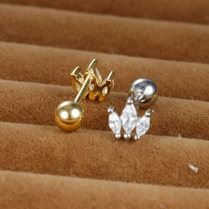 Macro shot of marquise zirconia screw-back stud earrings in gold and silver finish