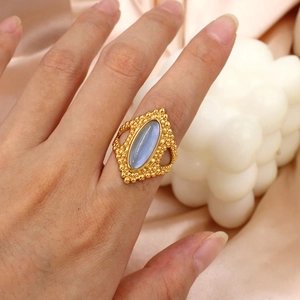 Bohemian gold stainless steel open ring featuring a blue natural stone for women