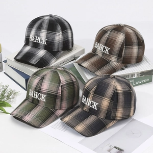 Plaid baseball caps with BAHCK embroidery in four classic checkered patterns