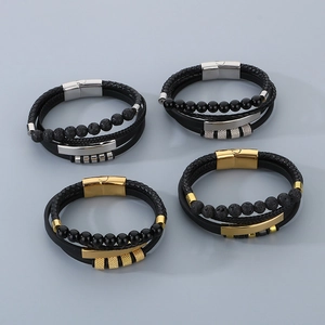 Detail view of multi-layer leather bracelets with volcanic stone and metal magnetic clasp