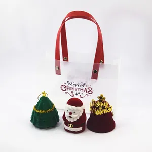 Christmas gift set with Santa Claus and tree jewelry boxes in a festive frosted bag
