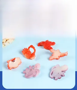 Detailed view of realistic PVC sea creature models like octopus and crab for DIY decor
