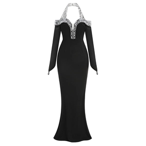 Detail of elegant sequined halter neckline and shoulder accents on a black evening gown