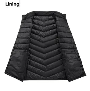 Detail view of the black puffer vest inner lining featuring a neat V-shaped quilting pattern