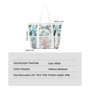 Strandtasche aus Mesh mit tropischem Blattmuster und mehreren transparenten Staufächern
