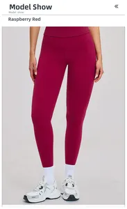 Lower body view of high waist raspberry red yoga leggings with athletic slim fit design