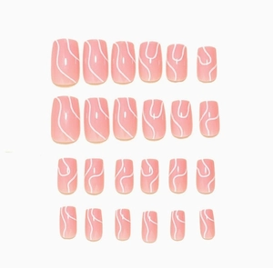 Detail of 24pcs pink press-on nails featuring white abstract wavy lines and glossy finish