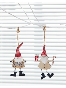 Detail of wooden Christmas gnomes with spring legs, Xmas sign and festive accessories