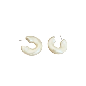 Elegant cream white C-shaped acrylic earrings with polished glaze finish for women
