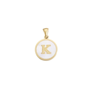 Macro shot of a golden round pendant with shell inlay featuring a gold letter K charm