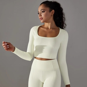 Detail of light yellow seamless ribbed fabric on high-elasticity yoga long sleeve top