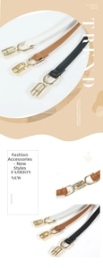 Detail view of thin women's belts in white, brown and black with gold U-shaped buckles
