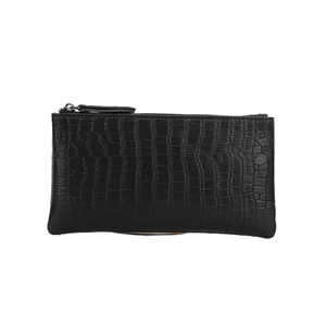 Close-up of black crocodile pattern leather texture and zipper detail on the clutch bag