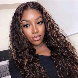 Detailed close-up of long wavy afro curls with black and brown highlights for women