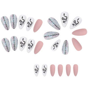 Detail of almond-shaped press-on nails with snake print and holographic patterns