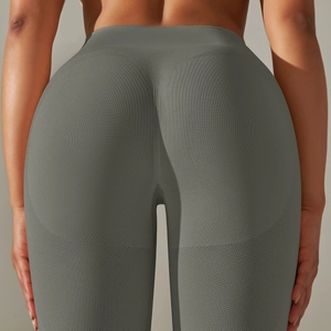 Detail view of the scrunch butt lifting design on seamless high waist grey yoga pants