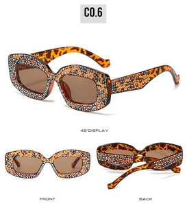Detail shots of leopard print rhinestone cat eye sunglasses in front and side views