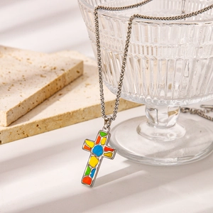 Polished silver stainless steel necklace with a colorful octopus cross pendant