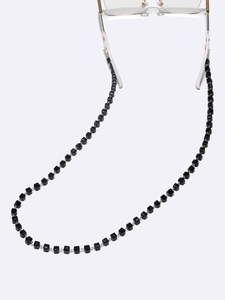 Detail of gold chain with black square crystal beads and silicone non-slip eyeglass loops
