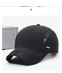 Close-up of black breathable mesh fabric and red label detail on quick-dry sun hat