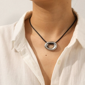 Minimalist irregular hollow oval stainless steel pendant necklace on female model