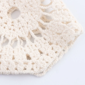 Jupe longue au crochet beige pour la plage avec motifs élégants en tricot ajouré