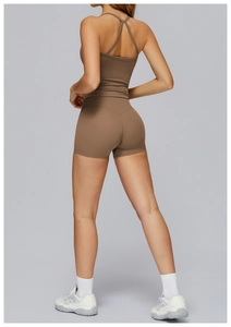 Close-up back view of brown brushed yoga set with racerback top and high waist shorts