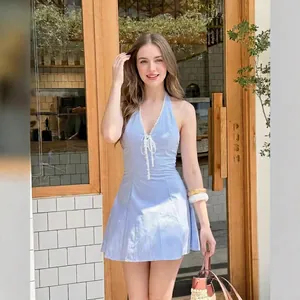 Light blue striped halter dress with deep V-neck and delicate white lace detailing
