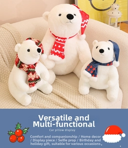 Three plush Christmas polar bears with scarves in a cozy home setting, various sizes