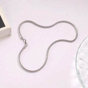 Close-up of polished silver fox tail chain with a secure lobster clasp closure